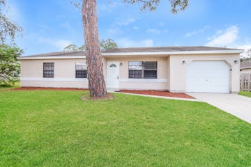 1460 CASS AVE N W PALM BAY, FL 32907